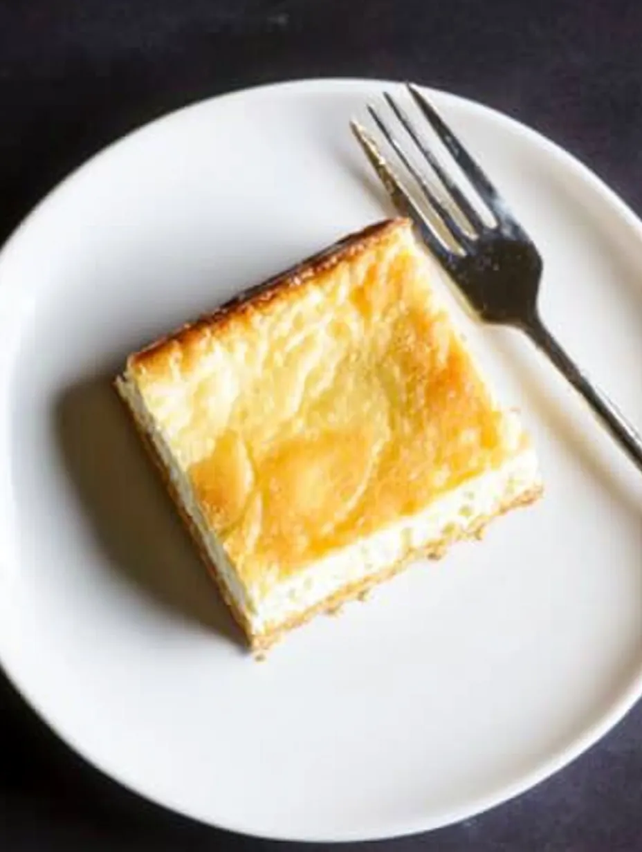 A slice of vanilla custard cream squares.
