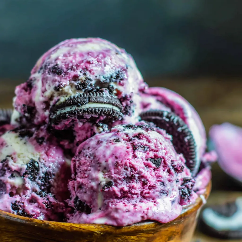 A bowl of black raspberry Oreo ice cream.